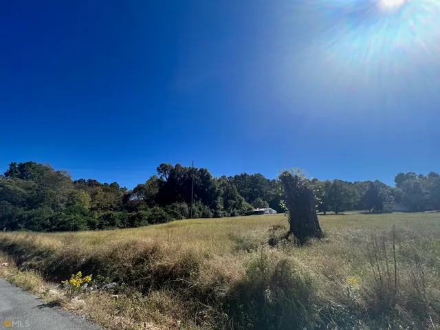 a view of lake with mountain in background