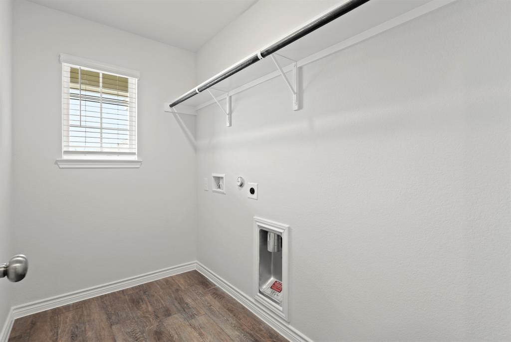 1603 Romans Road Ennis, TX 75119 - Photo 9 of 21 a view of storage and utility room with a fireplace