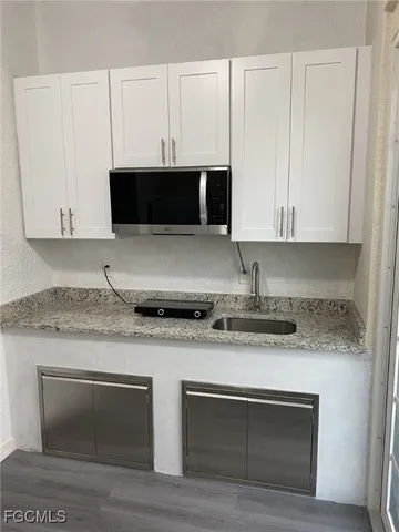 $1,100 | 1119 Colonial Street East, Lehigh Acres, FL 33974