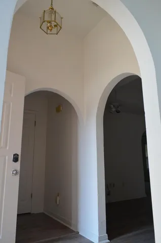 a white toilet sitting next to a bathroom sink