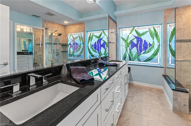 a view of a hallway with furniture