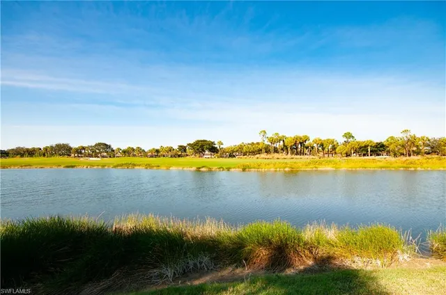 a view of a lake and houses