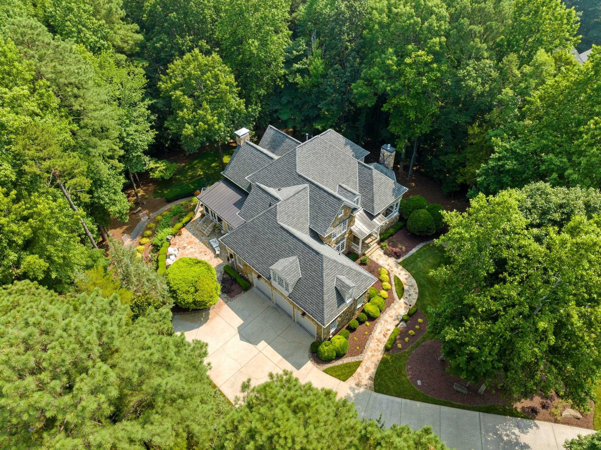 11309 Brass Kettle Road Raleigh, NC 27614 - Photo 2 of 6 an aerial view of a house with swimming pool and garden space