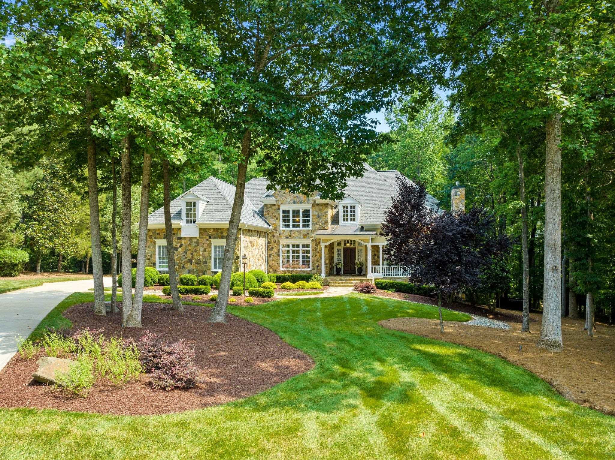 11309 Brass Kettle Road Raleigh, NC 27614 - Photo 3 of 6 a front view of a house with a yard