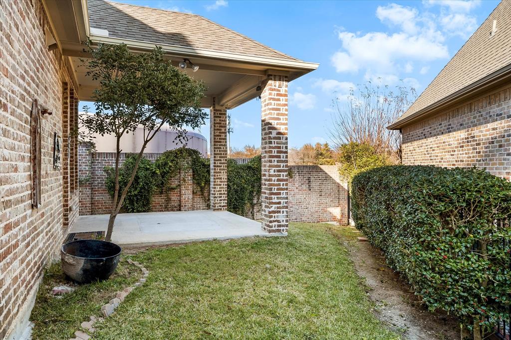 6814 Springwood Lane Garland, TX 75044 - Photo 30 of 35 a view of a backyard