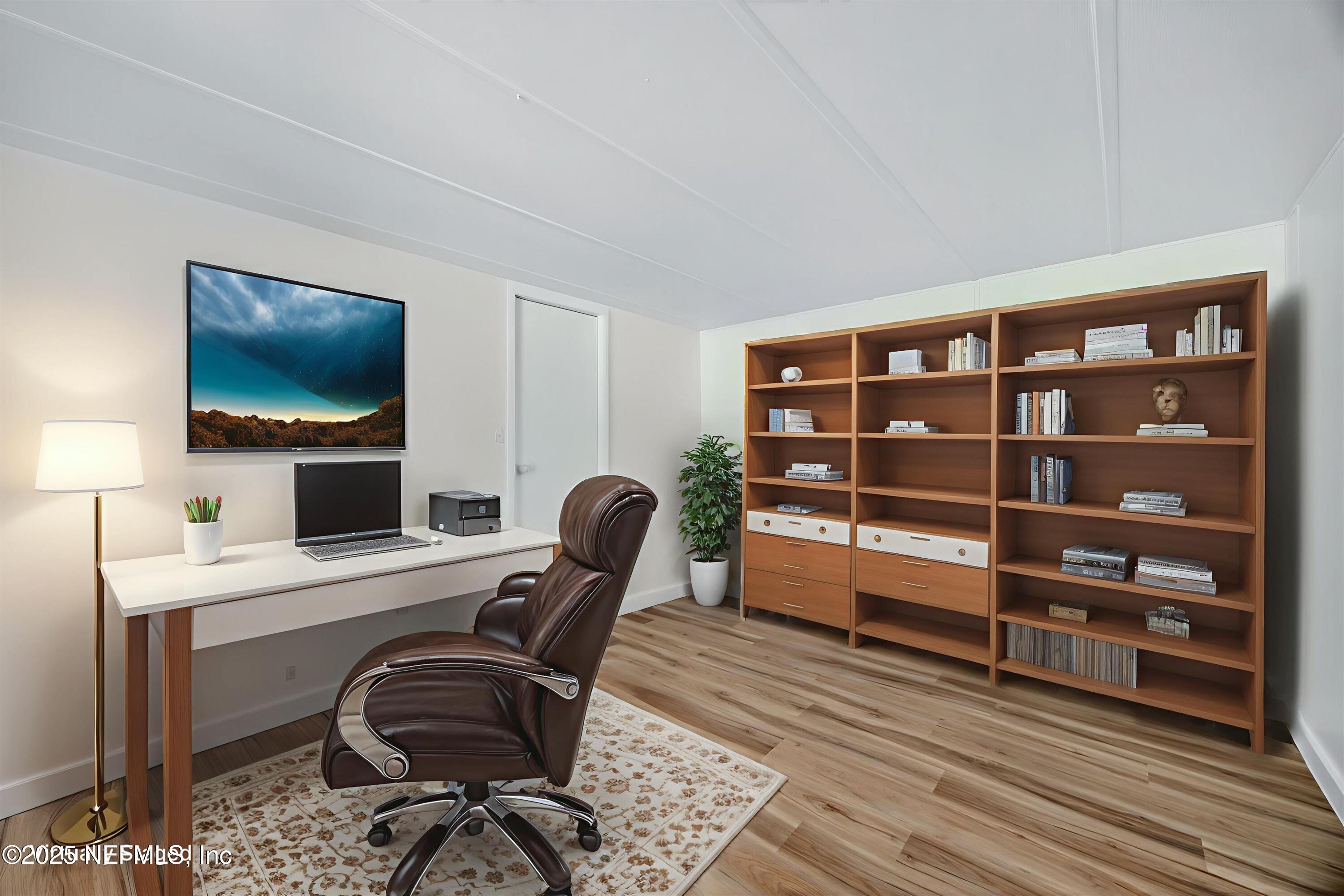 349 Stokes Landing Road St. Augustine, FL 32095 - Photo 12 of 45 a view of a workspace with furniture and a window