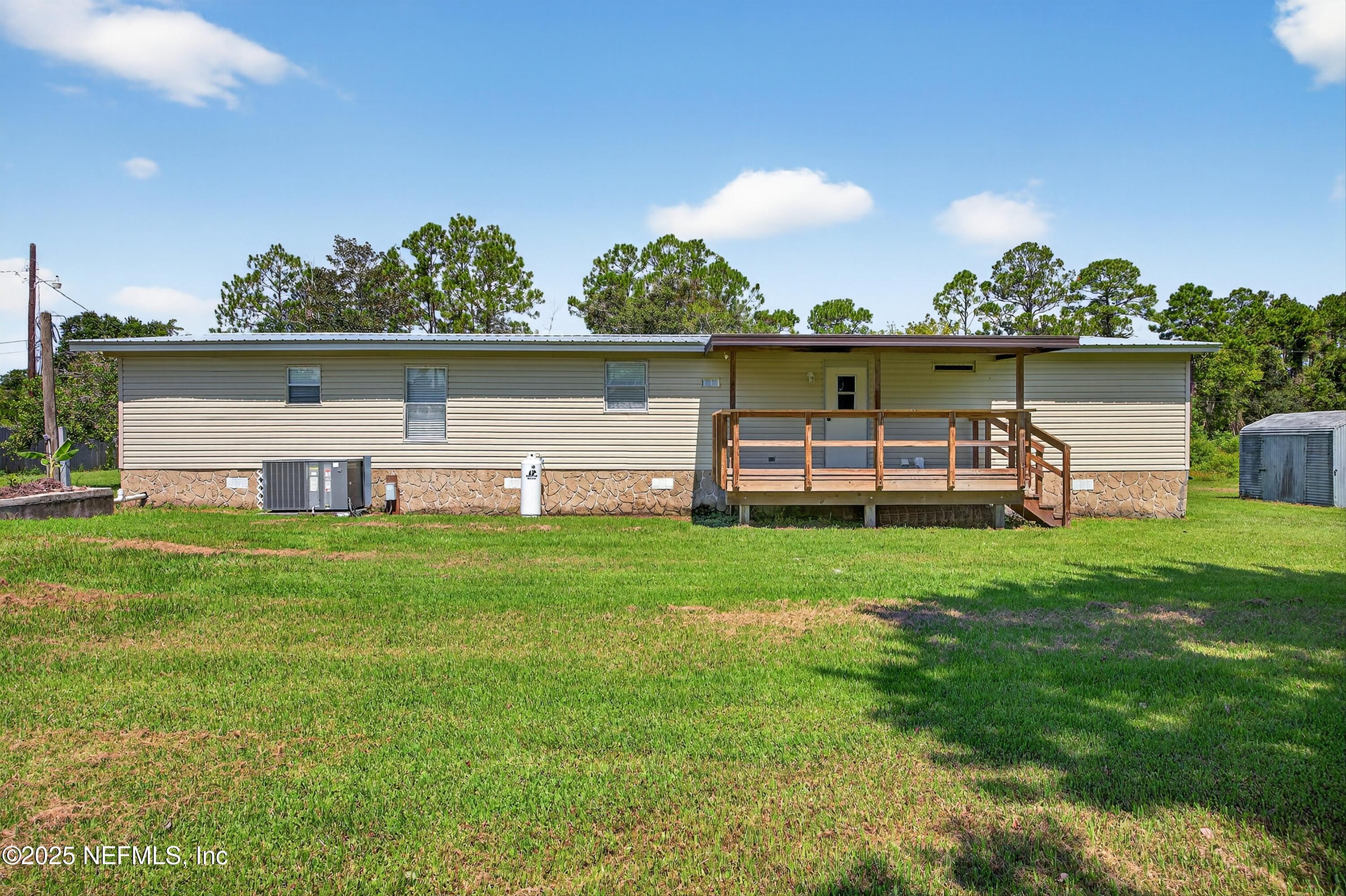 349 Stokes Landing Road St. Augustine, FL 32095 - Photo 35 of 45 a view of a backyard with a garden and plants