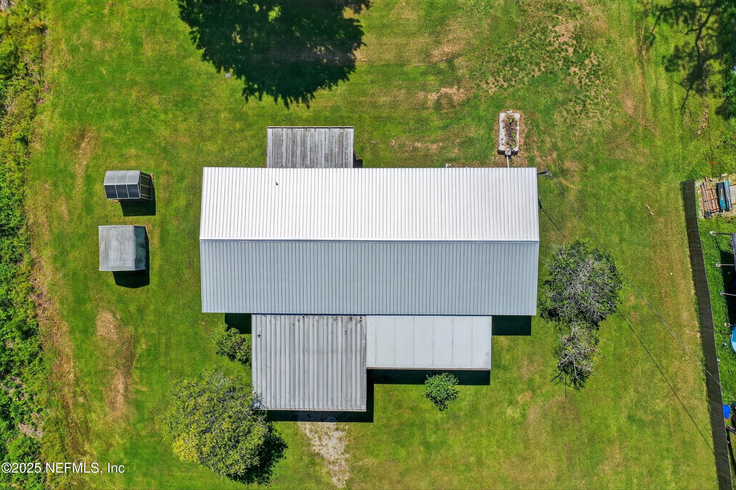349 Stokes Landing Road St. Augustine, FL 32095 - Photo 36 of 45 an aerial view of a house with a yard basket ball court and outdoor seating