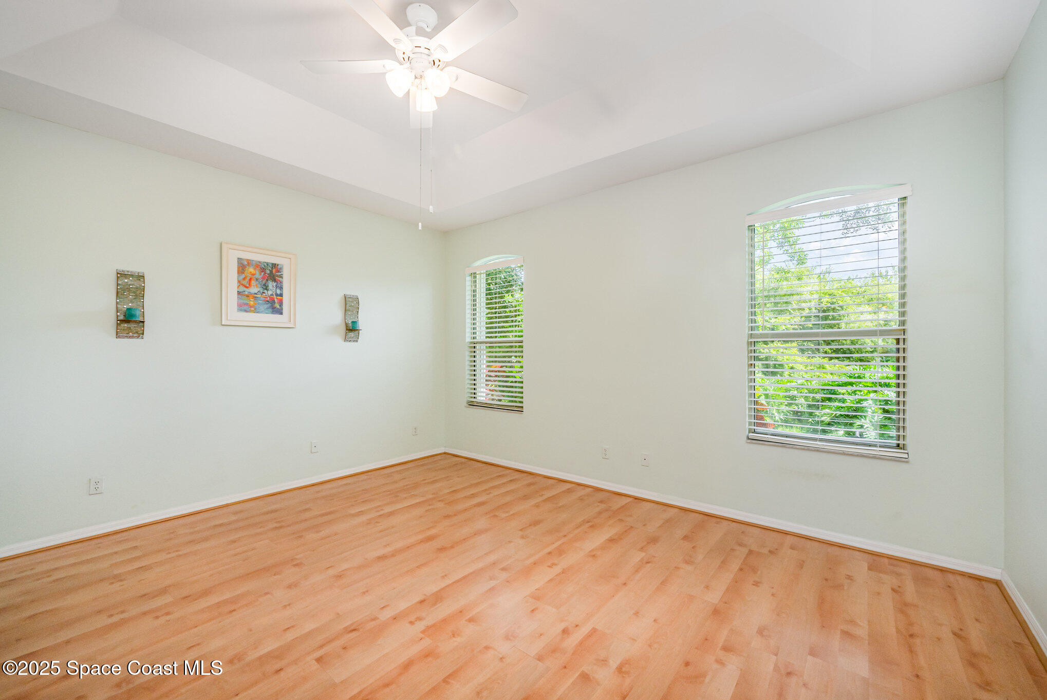 968 Wimbledon Drive Melbourne, FL 32940 - Photo 19 of 47 a view of an empty room with a window