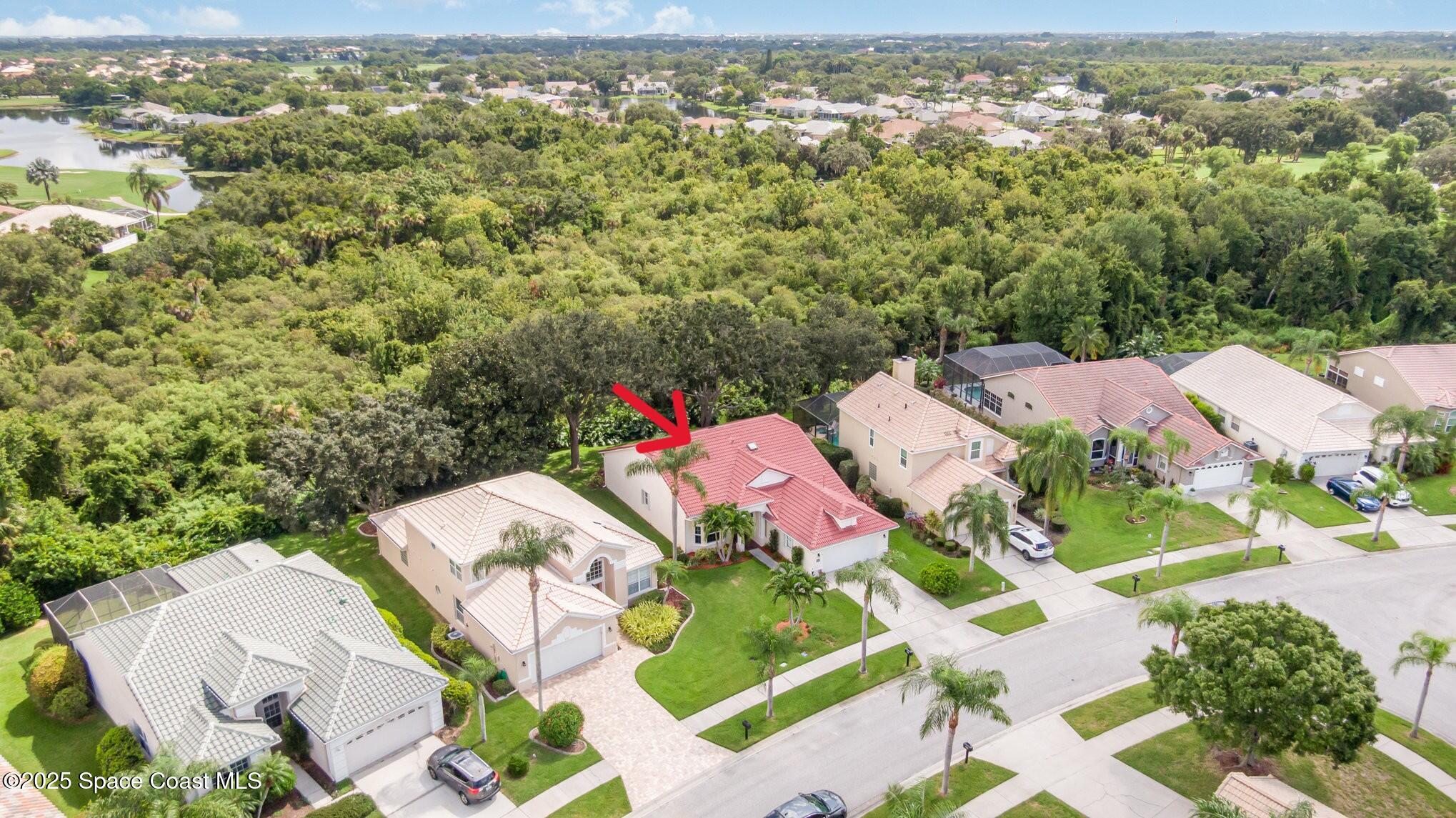 968 Wimbledon Drive Melbourne, FL 32940 - Photo 2 of 47 an aerial view of residential houses with outdoor space