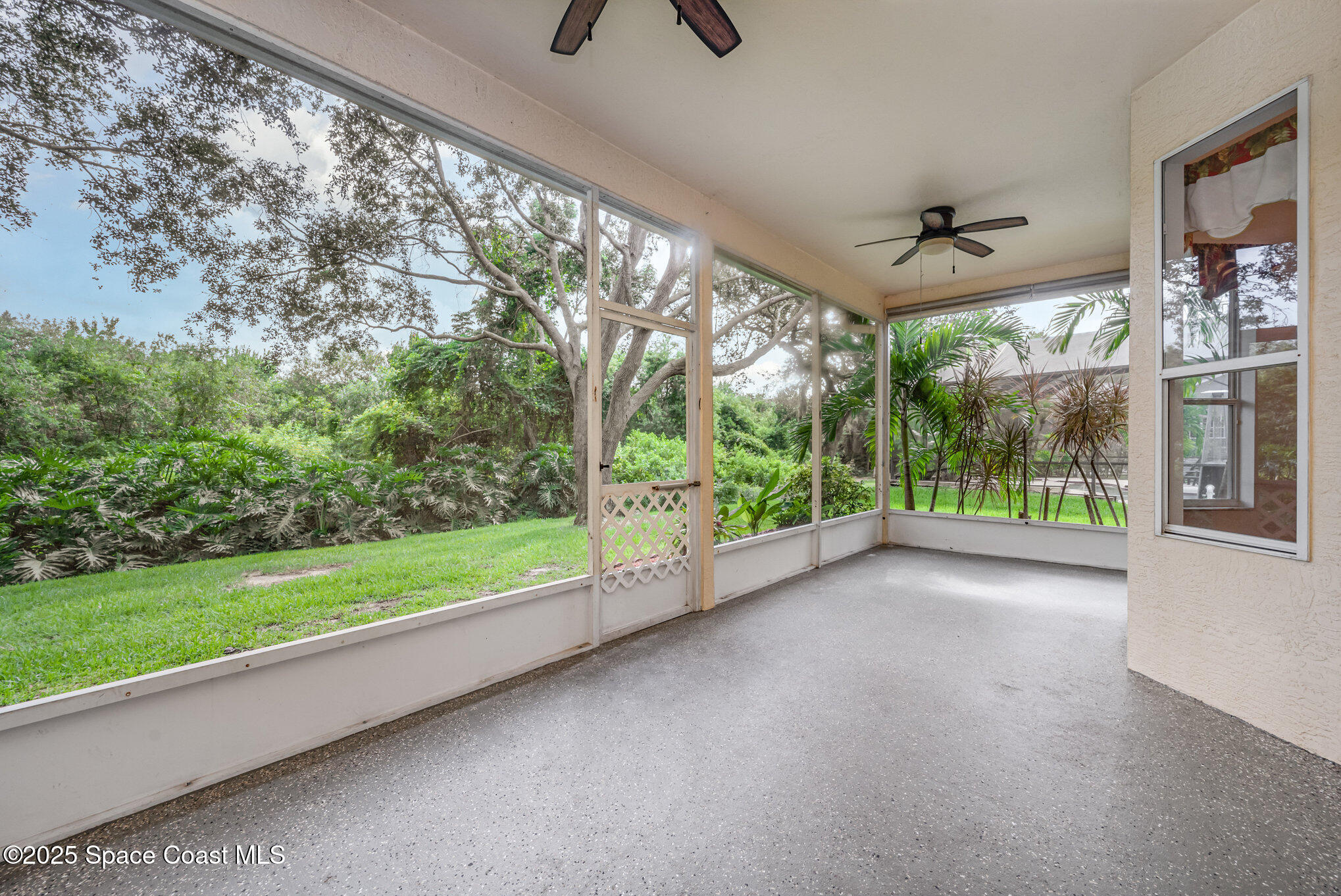 968 Wimbledon Drive Melbourne, FL 32940 - Photo 27 of 47 a view of a garden with an outdoor space