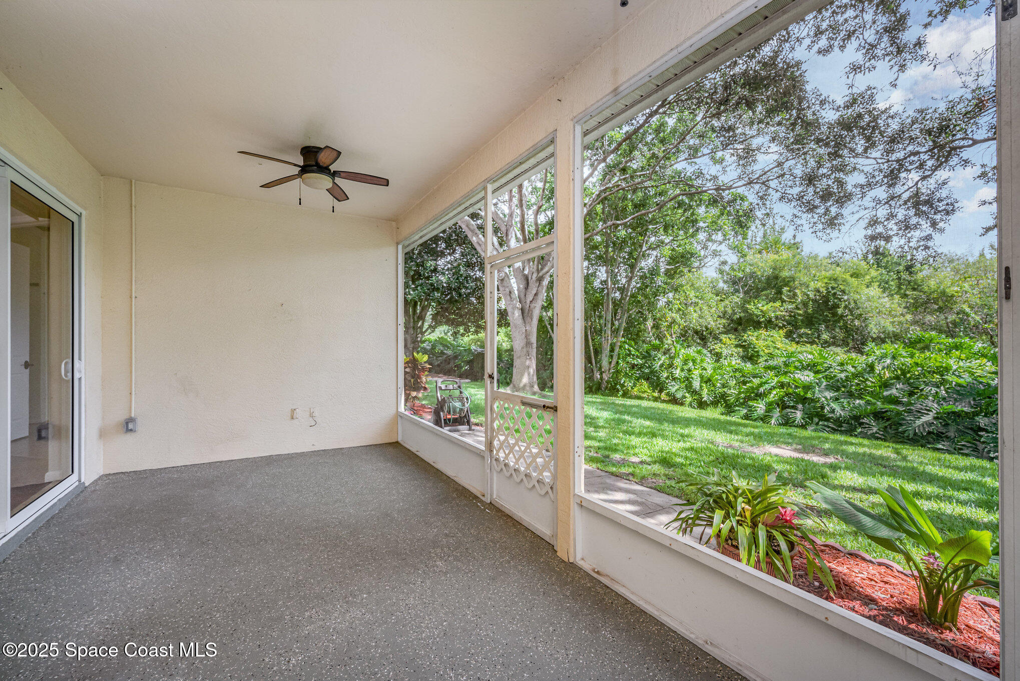 968 Wimbledon Drive Melbourne, FL 32940 - Photo 28 of 47 a view of room with window and backyard