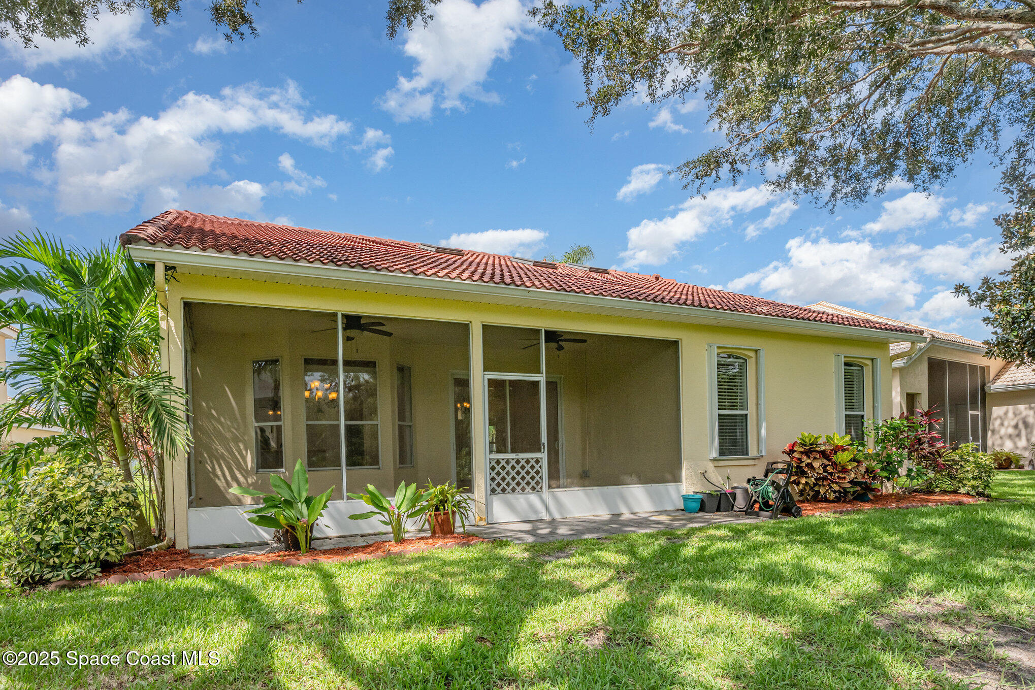 968 Wimbledon Drive Melbourne, FL 32940 - Photo 29 of 47 front view of a house with a yard