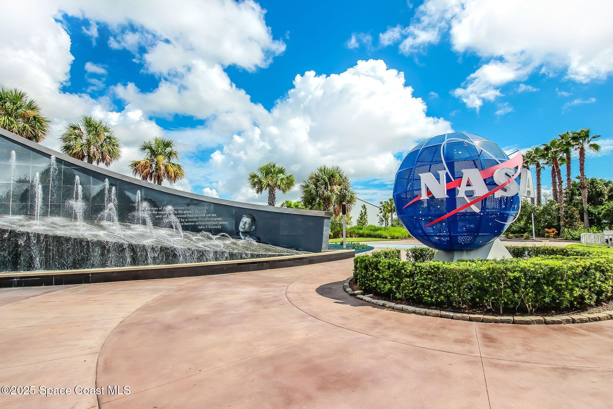 968 Wimbledon Drive Melbourne, FL 32940 - Photo 40 of 47 a view of a swimming pool with a pathway