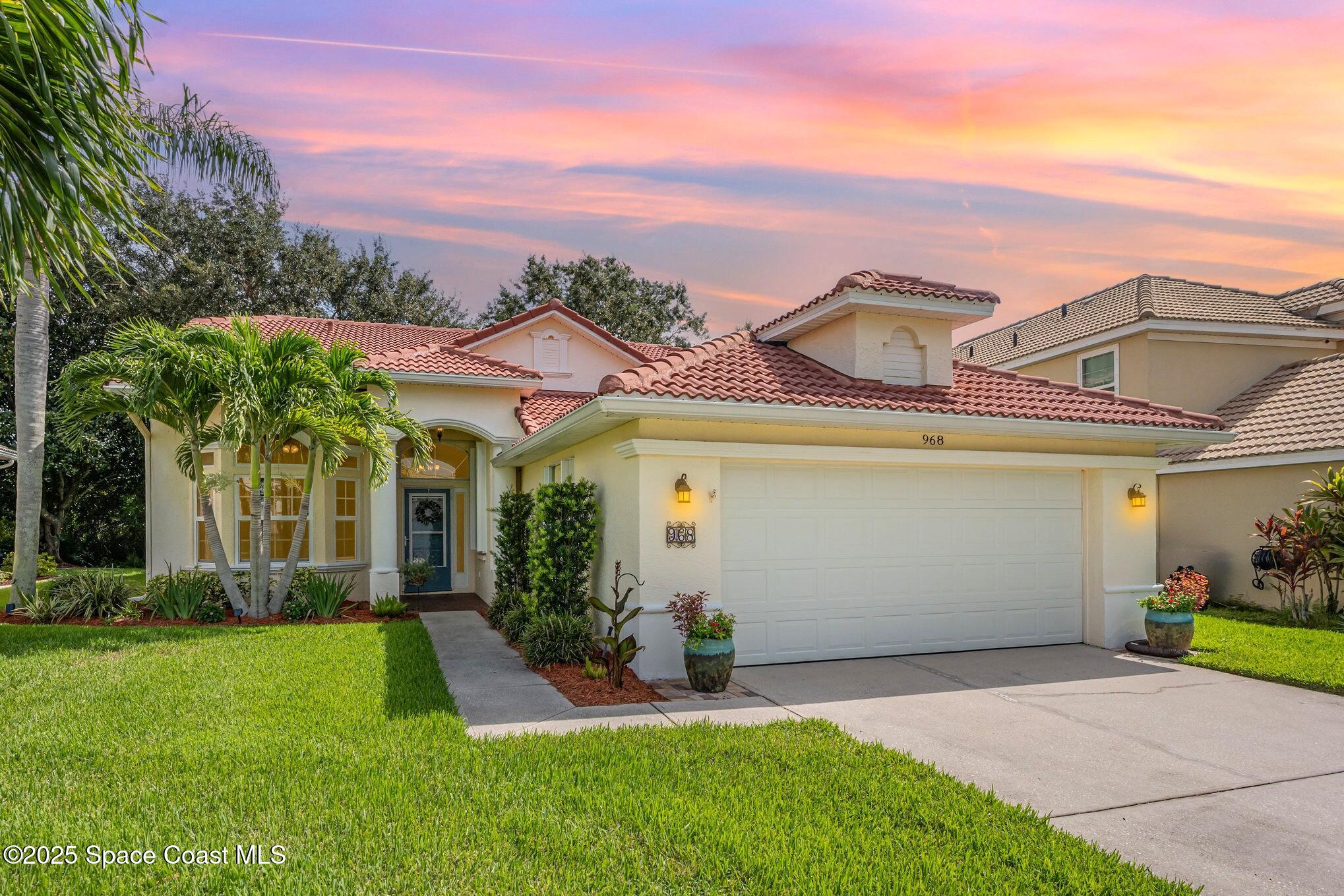 968 Wimbledon Drive Melbourne, FL 32940 - Photo 5 of 47 front view of a house with a yard