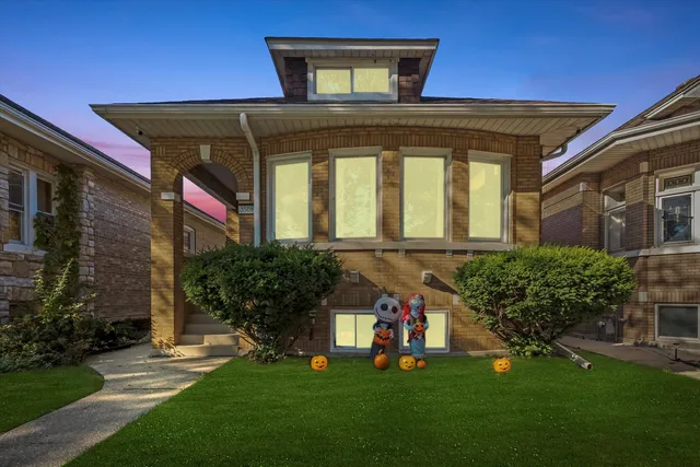 a front view of house with garden