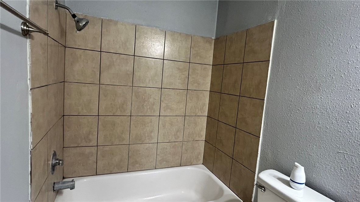 1004 Austin Street, Unit 9 Portland, TX 78374 - Photo 18 of 22 Tile surround for the shower