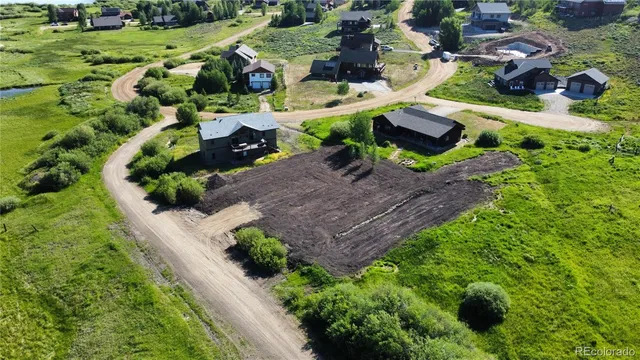 an aerial view of residential house with outdoor space