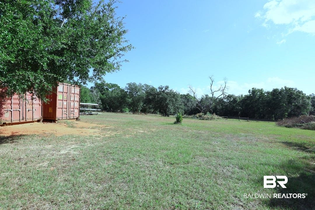 19180 Horseshoe Circle Seminole, AL 36574 - Photo 34 of 38 View of green lawn featuring a view of rural / pastoral area