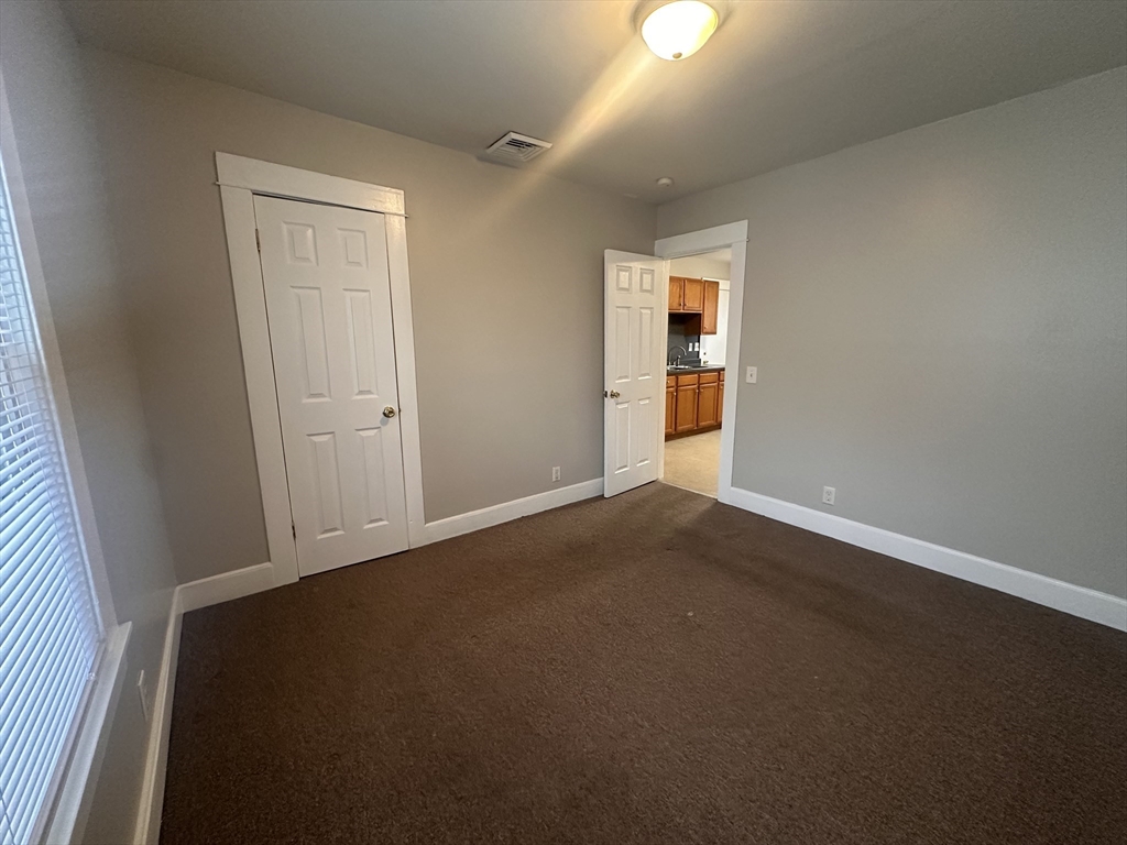 383 Newbury Street, Unit 2 Springfield, MA 01104 - Photo 11 of 11 an empty room with window