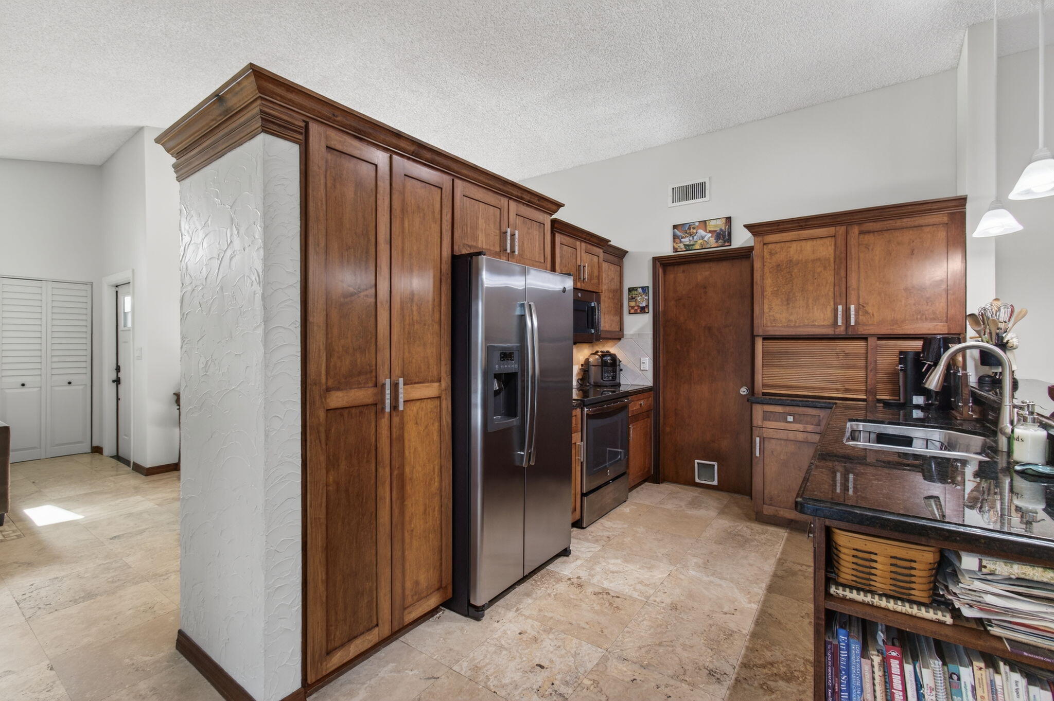 11457 Country Sound Court Boca Raton, FL 33428 - Photo 26 of 112 a kitchen with stainless steel appliances a refrigerator and a stove top oven