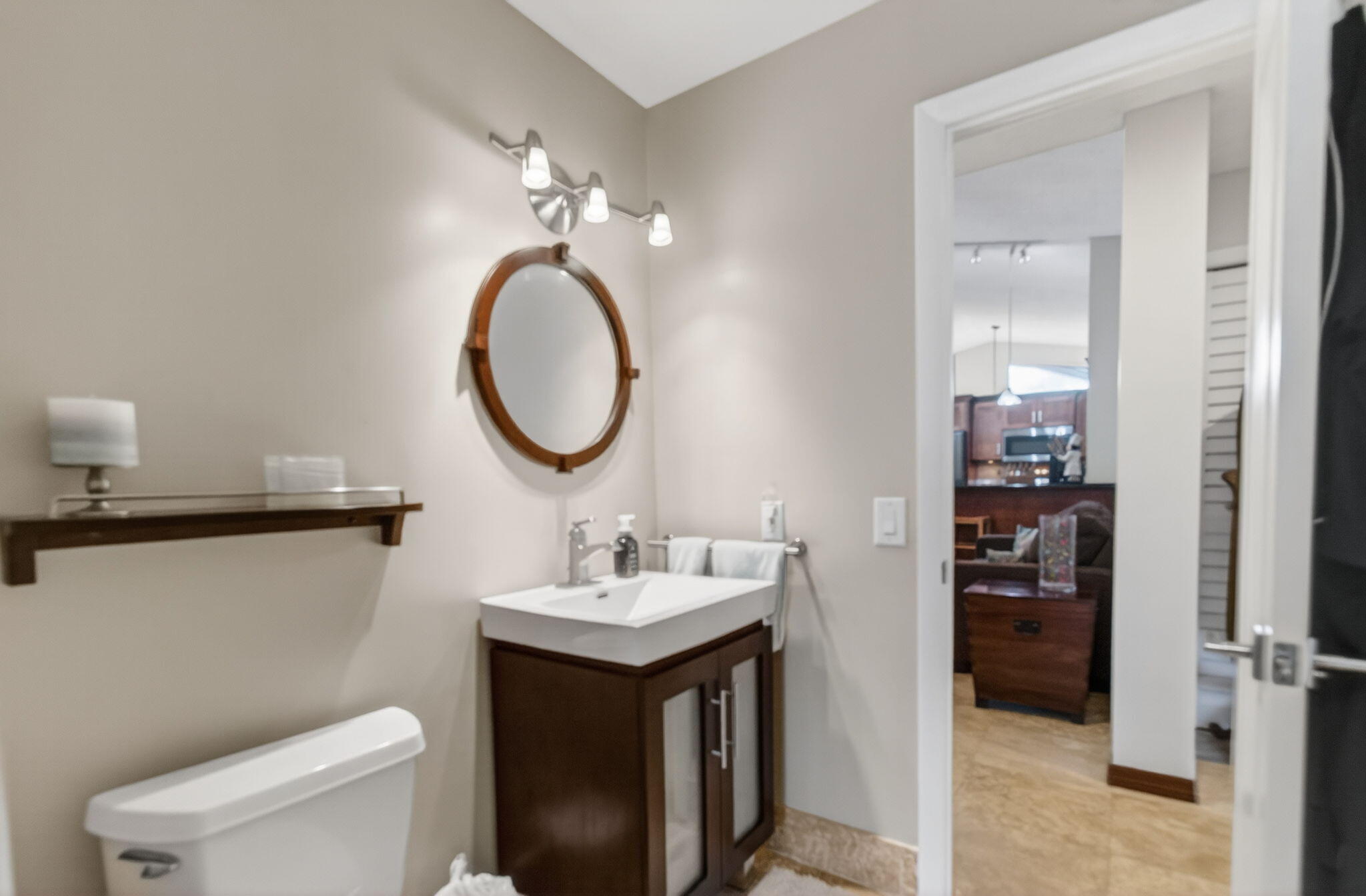 11457 Country Sound Court Boca Raton, FL 33428 - Photo 41 of 112 a bathroom with a toilet a sink and a mirror