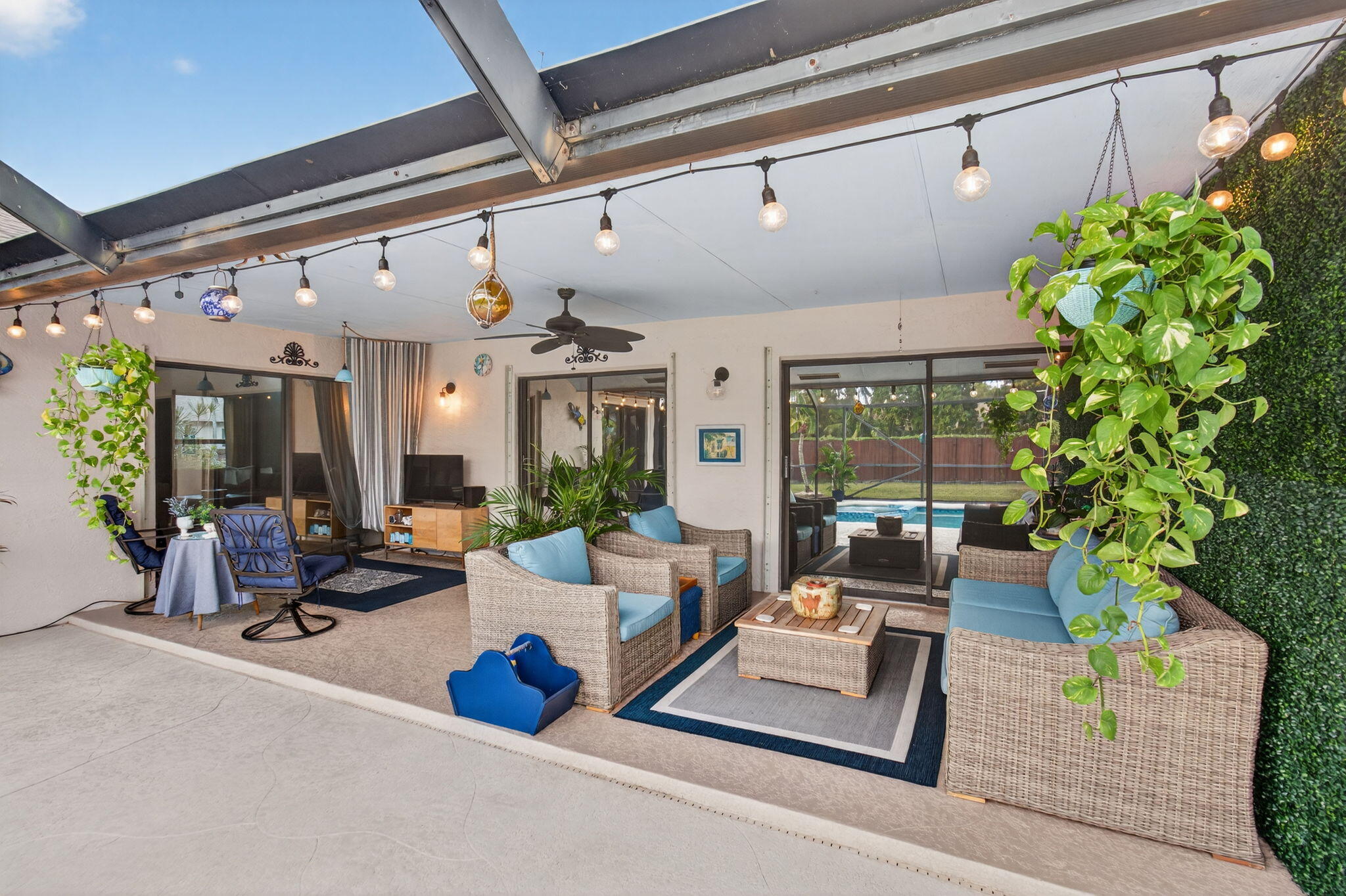 11457 Country Sound Court Boca Raton, FL 33428 - Photo 62 of 112 a living room with patio furniture and a potted plant