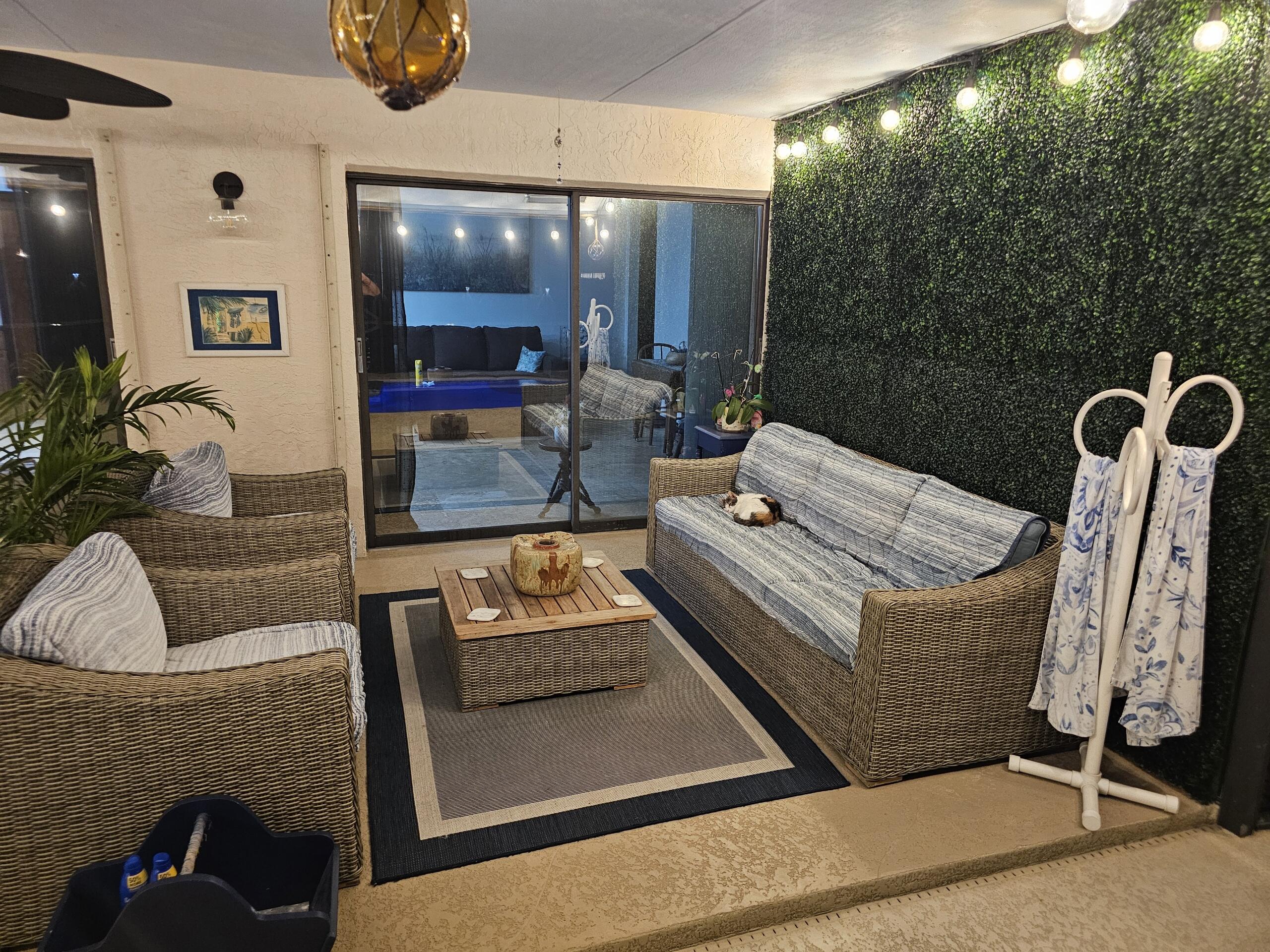 11457 Country Sound Court Boca Raton, FL 33428 - Photo 79 of 112 a living room with furniture and potted plants