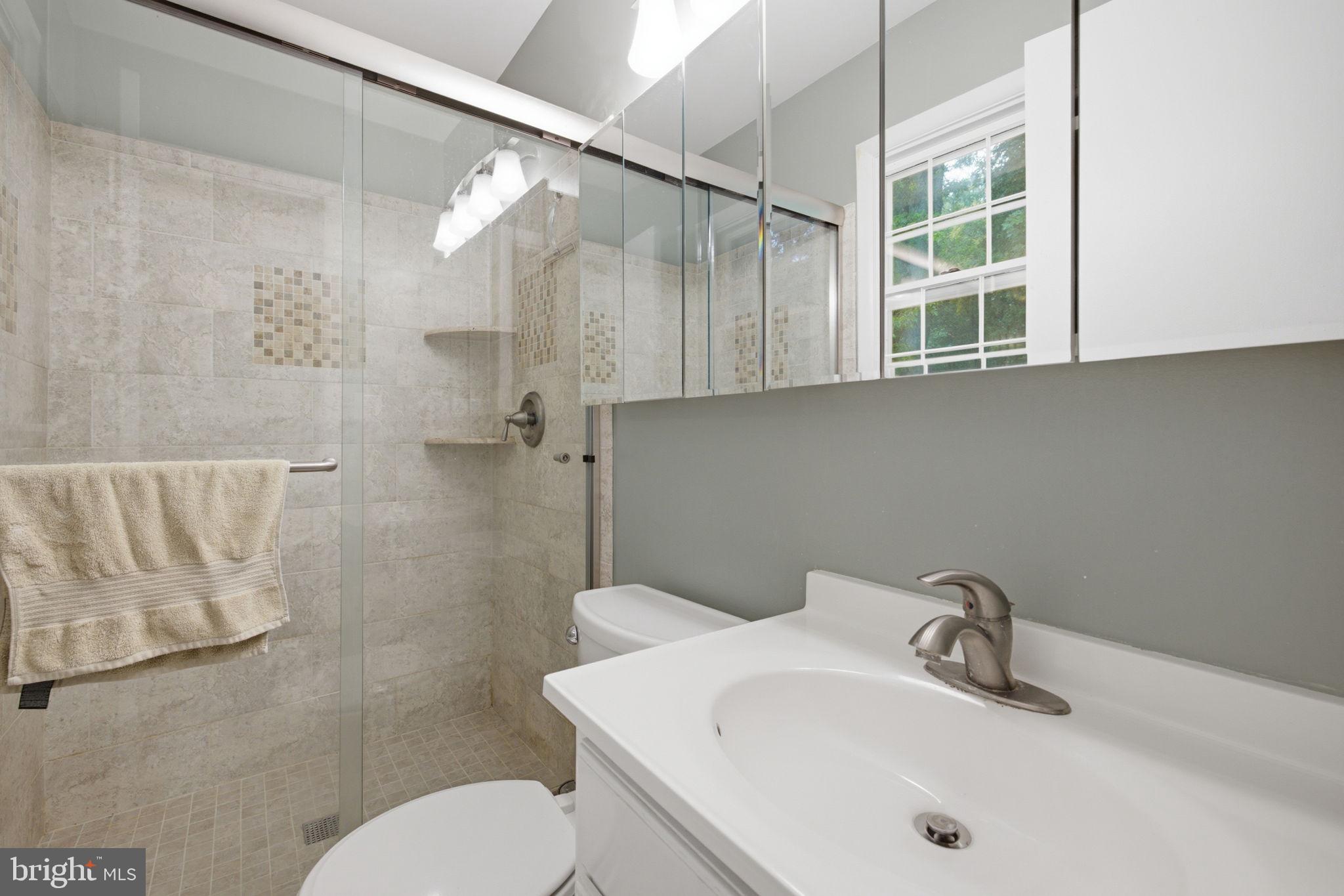 11937 Bayswater Road Gaithersburg, MD 20878 - Photo 18 of 55 Modern bathroom with sleek finishes.