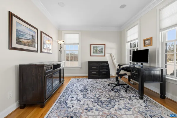 a kitchen with stainless steel appliances granite countertop a stove refrigerator and cabinets
