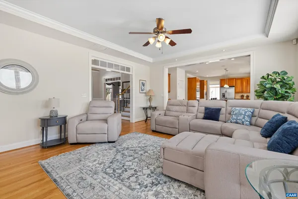 a spacious bedroom with a bed and a cabinets