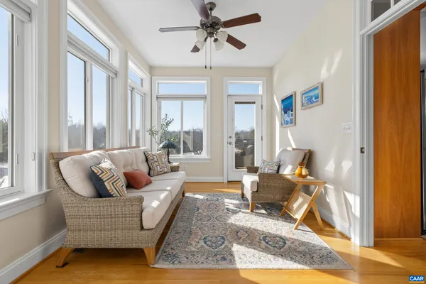 a spacious bathroom with a sink and a mirror