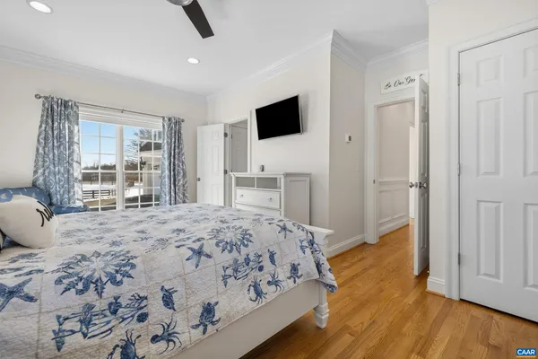 a bathroom with a sink mirror vanity and toilet