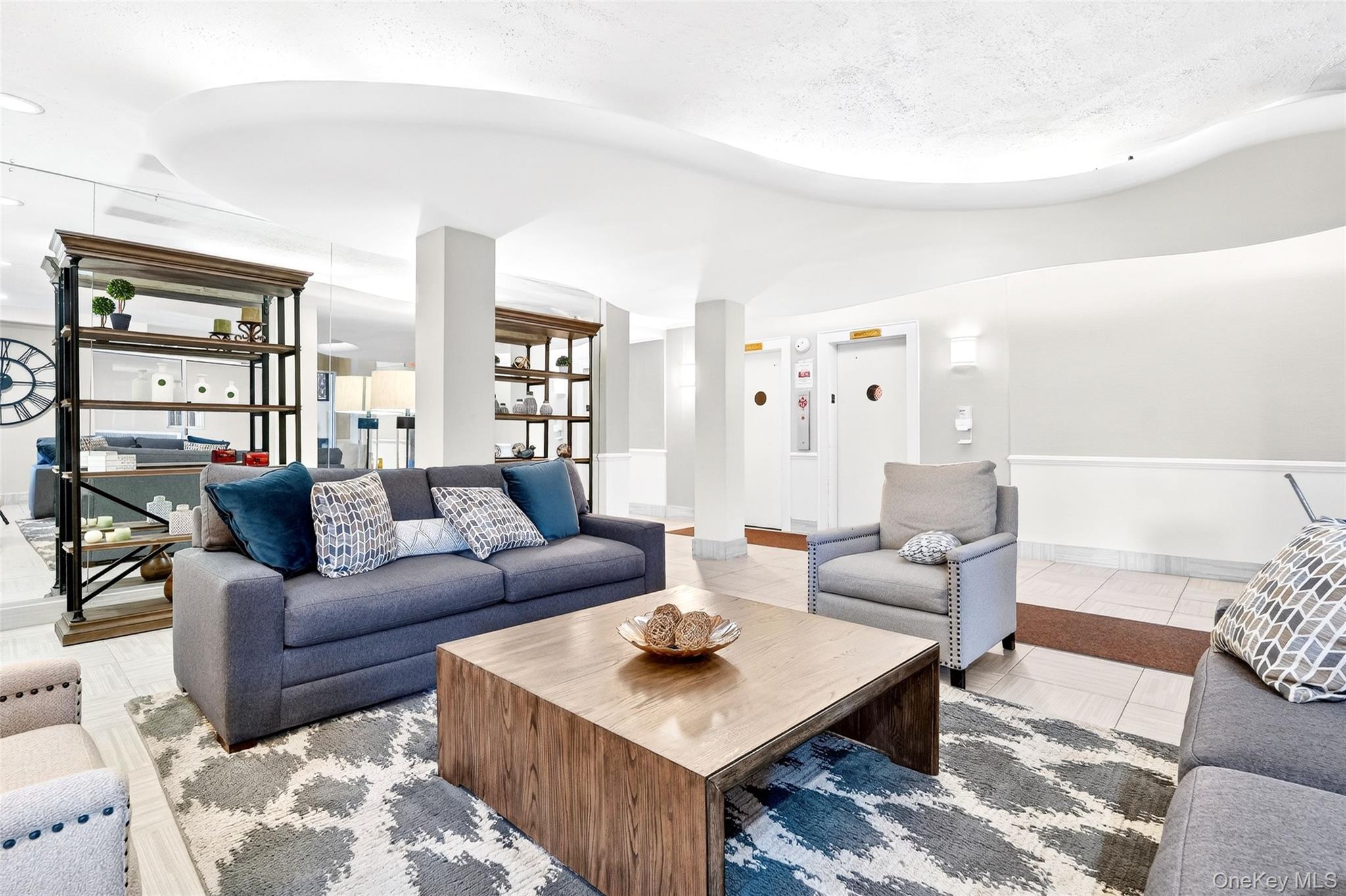 a living room with furniture and a table