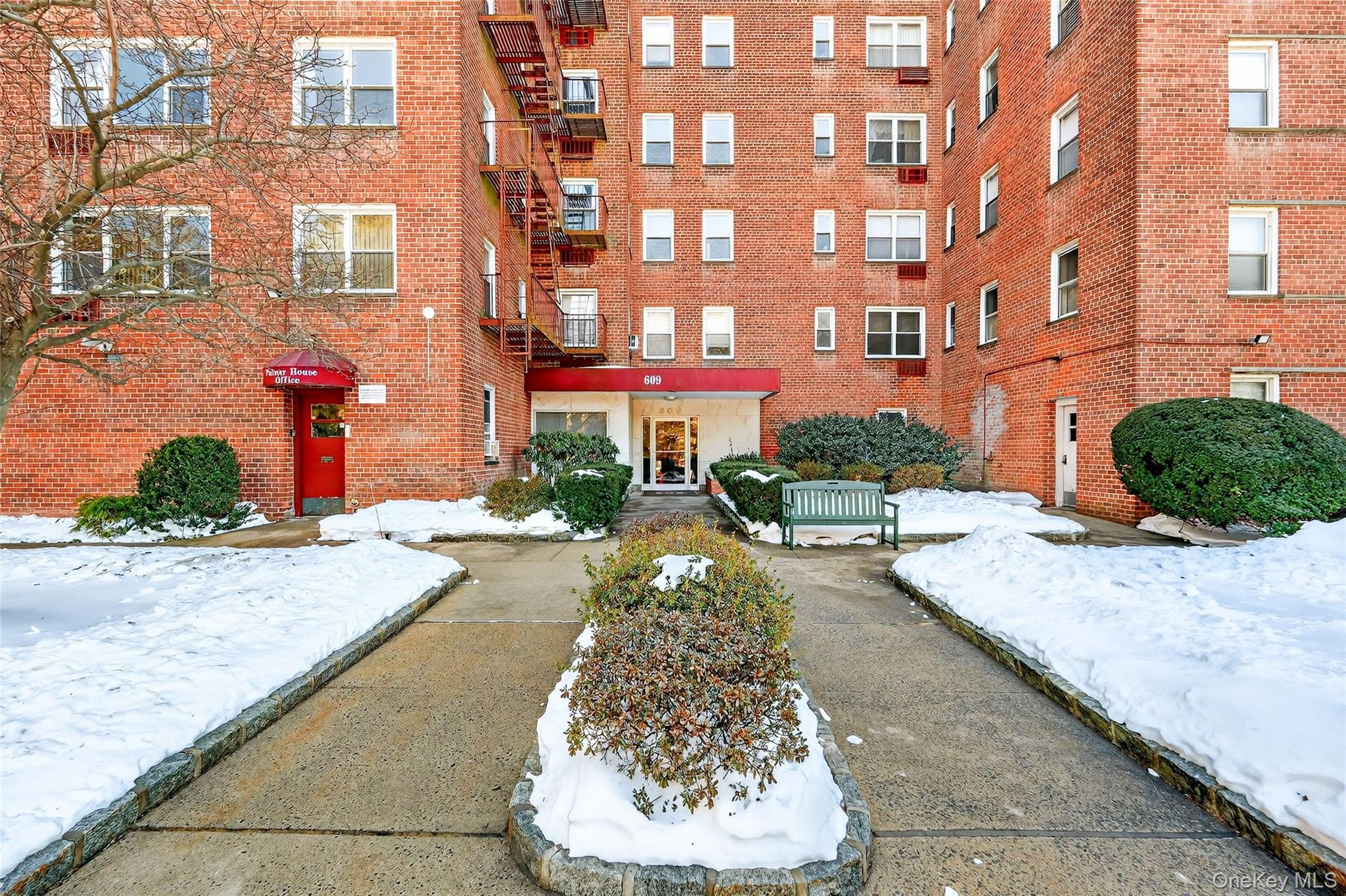 609 Palmer Road, Unit 5L Yonkers, NY 10701 - Photo 30 of 33 a view of a building with a street