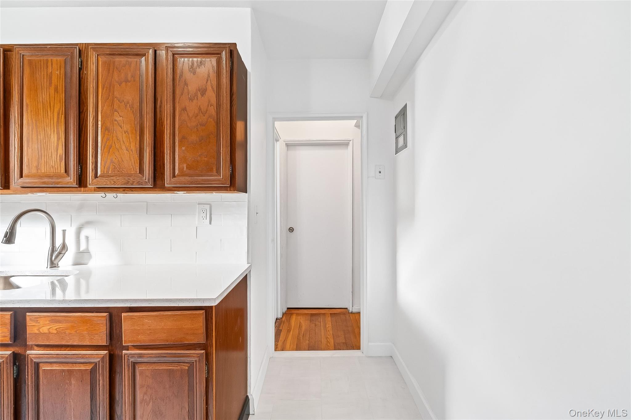 609 Palmer Road, Unit 5L Yonkers, NY 10701 - Photo 7 of 33 a bathroom with a sink and a mirror