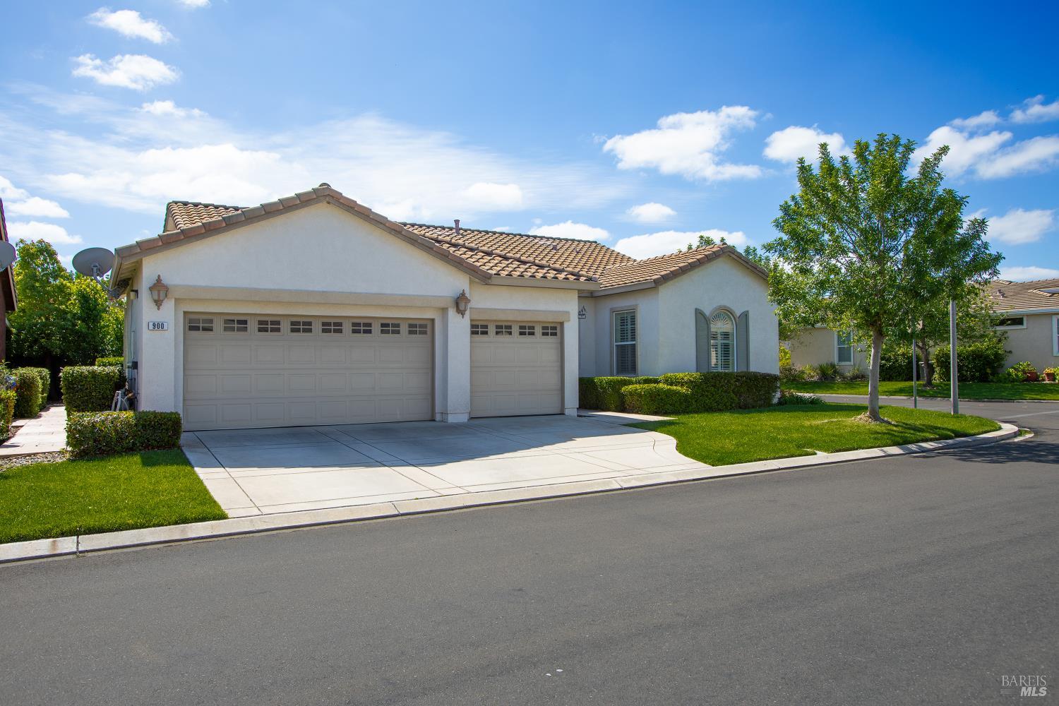 900 Livingston Place Rio Vista, CA 94571 - Photo 2 of 38 a front view of a house with a yard and garage