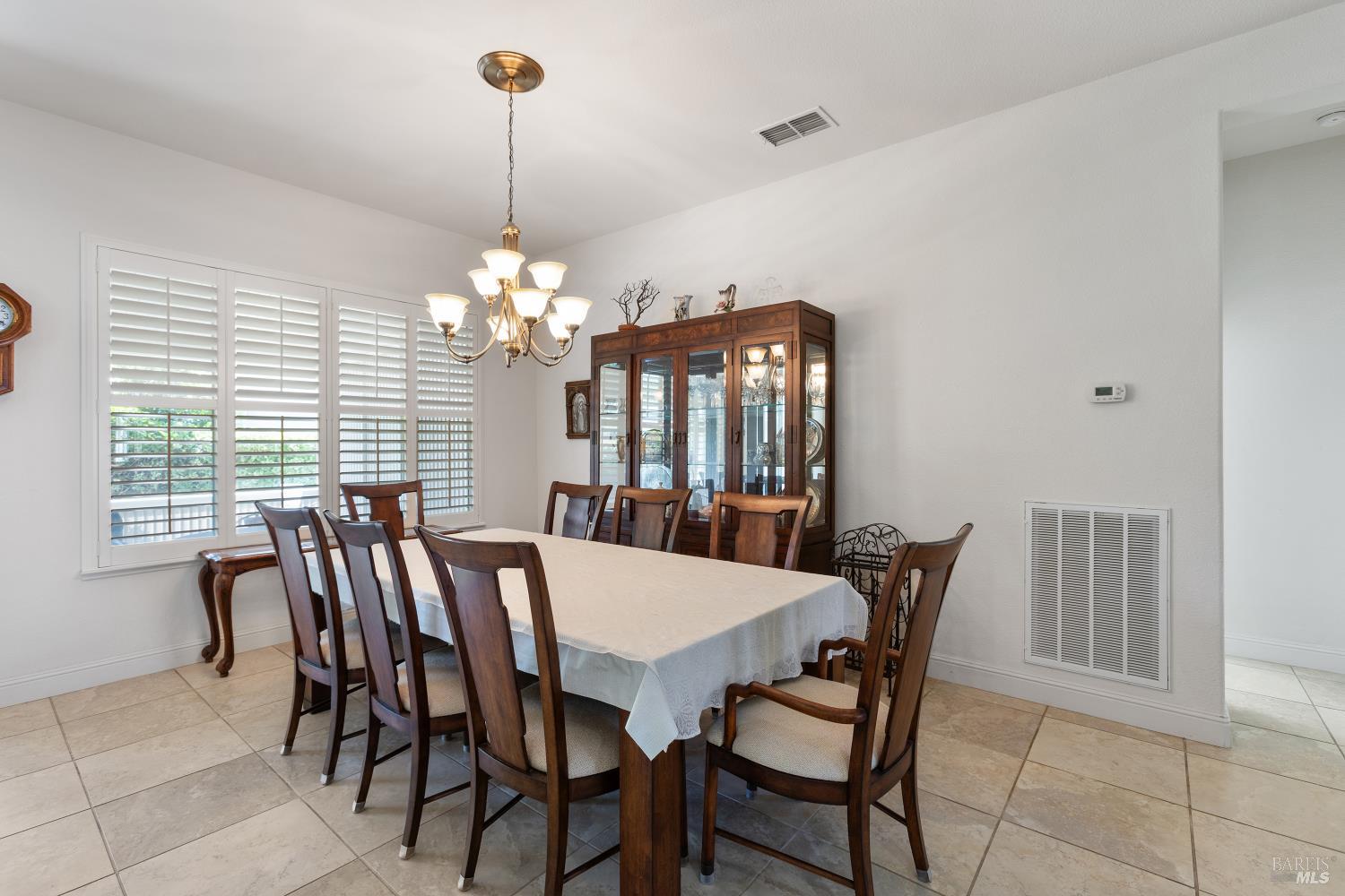 900 Livingston Place Rio Vista, CA 94571 - Photo 21 of 38 a view of a dining room with furniture and window