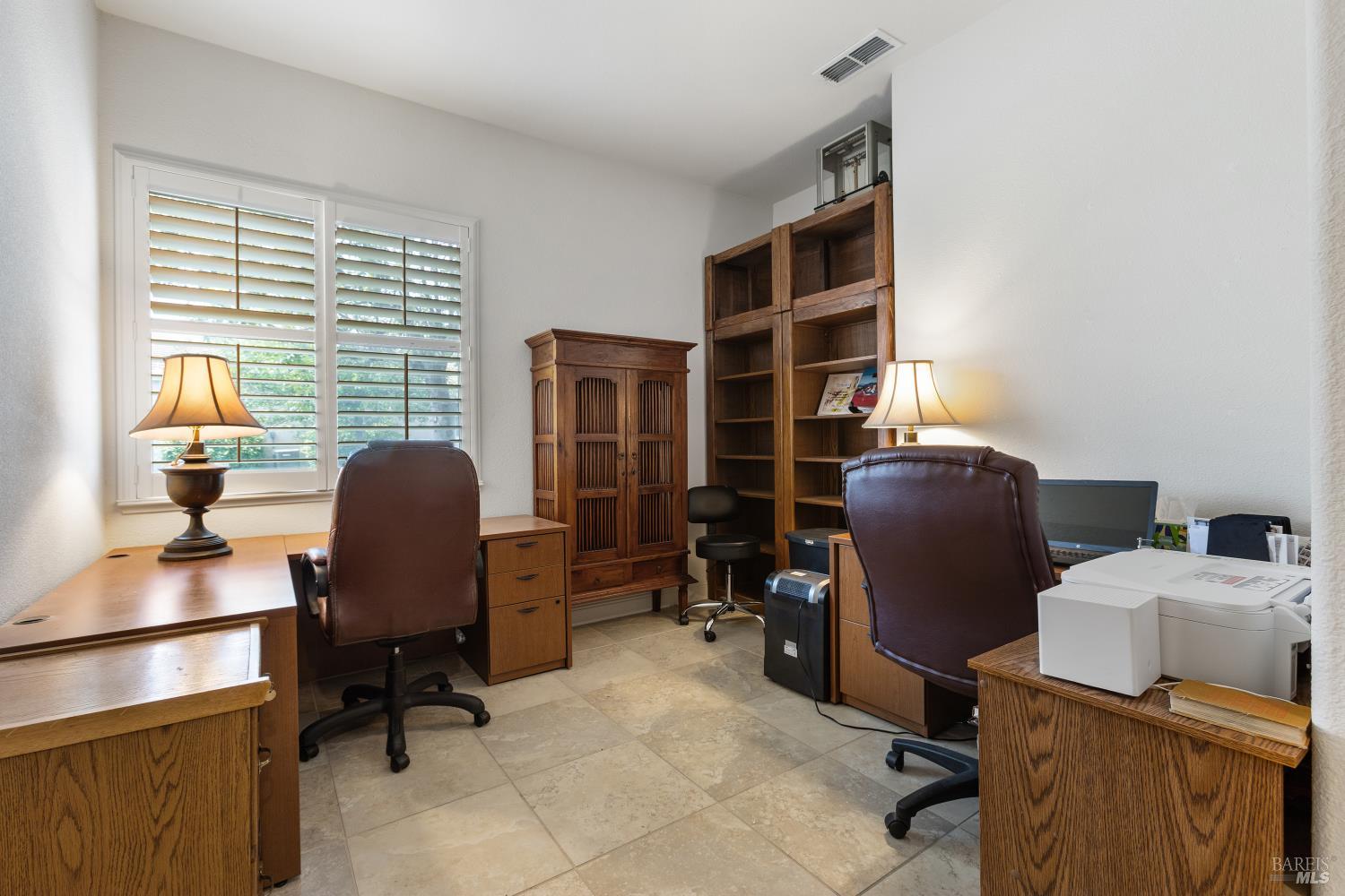 900 Livingston Place Rio Vista, CA 94571 - Photo 31 of 38 a view of workspace with wooden floor shelves