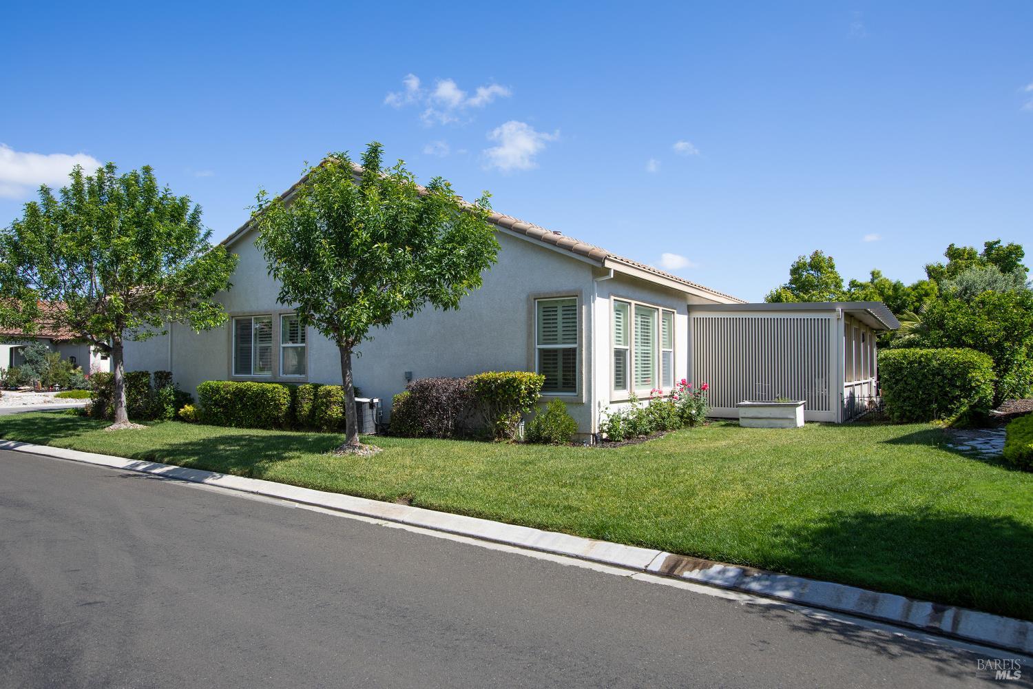 900 Livingston Place Rio Vista, CA 94571 - Photo 35 of 38 a front view of a house with a yard and garage
