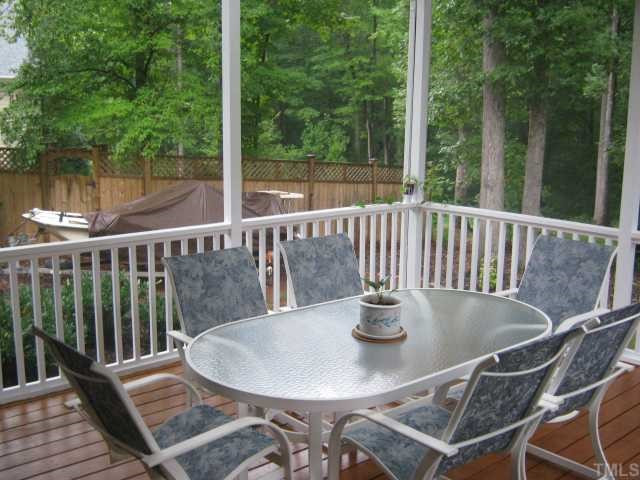 5201 Indigo Moon Way Raleigh, NC 27613 - Photo 8 of 12 Large screen porch with skylights, fan and beadboard ceiling! Screened Porch