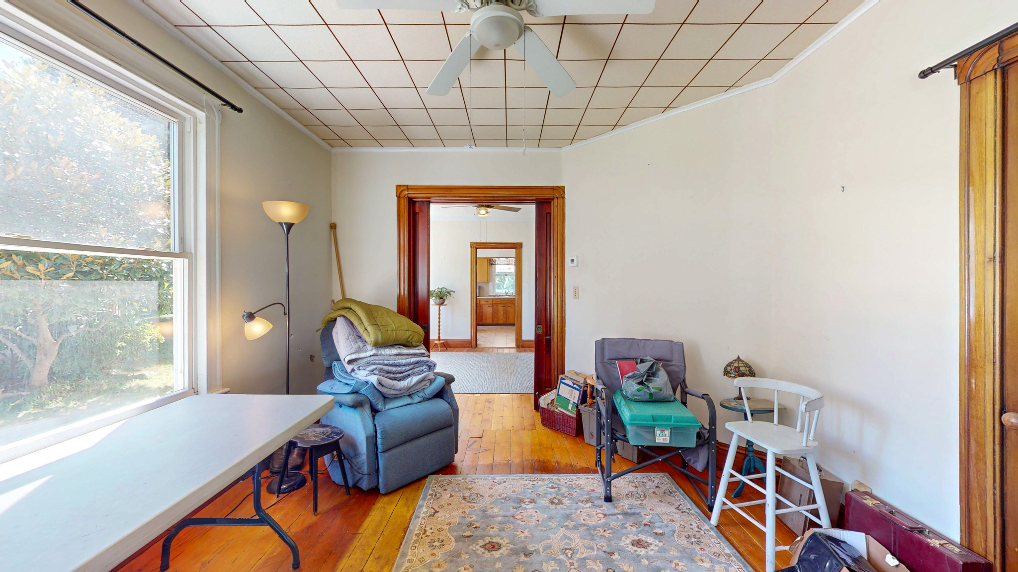 37 Sylvan Street Groton, CT 06340 - Photo 16 of 36 a living room with furniture a flat screen tv and a large window