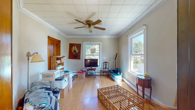 a living room with furniture and a window