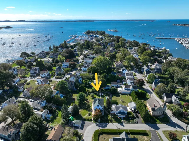 an aerial view of multiple house with outdoor space