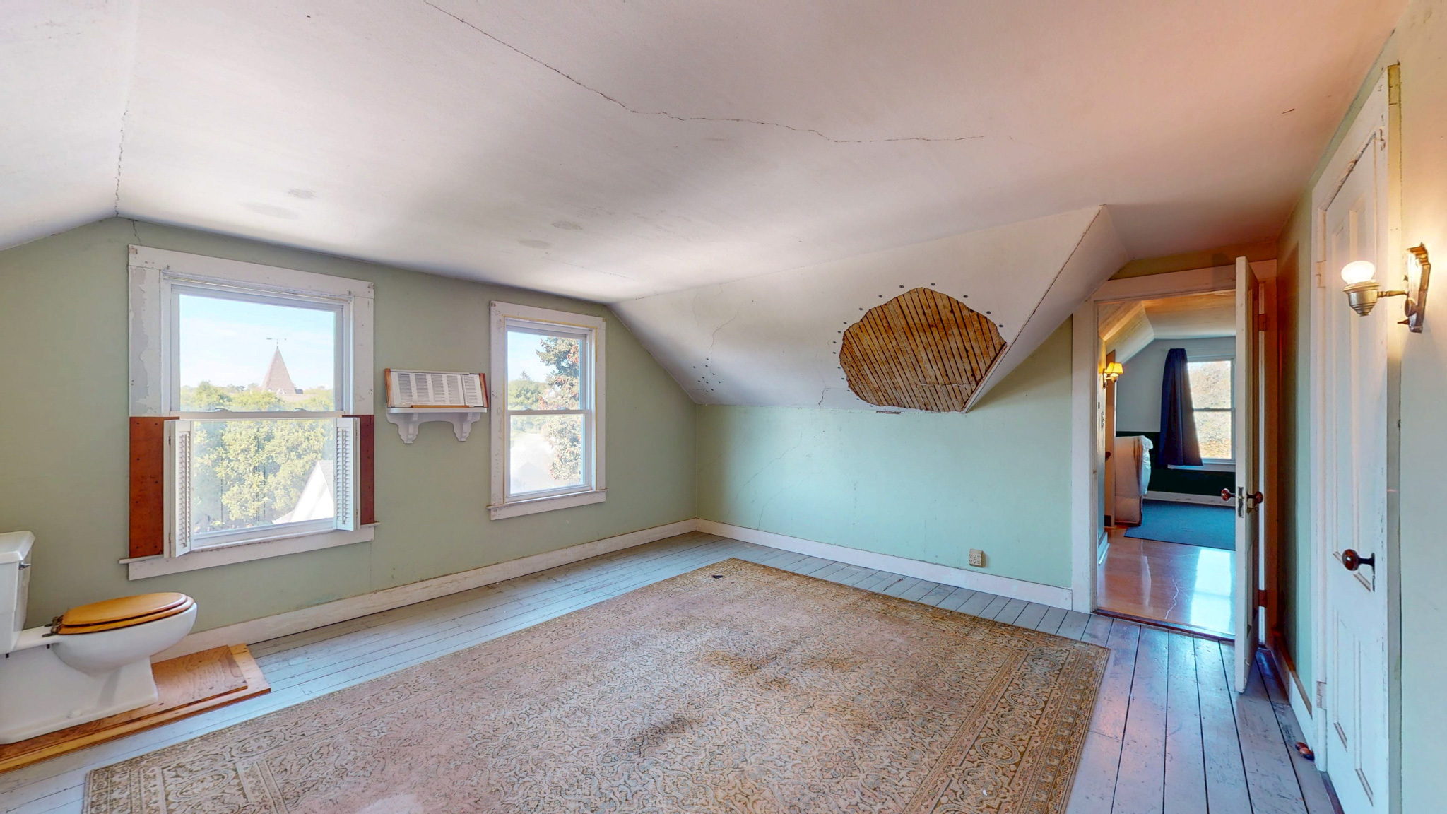 37 Sylvan Street Groton, CT 06340 - Photo 24 of 36 an empty room with windows and closet