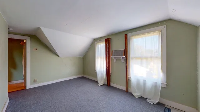 a view of a house with backyard porch and sitting area