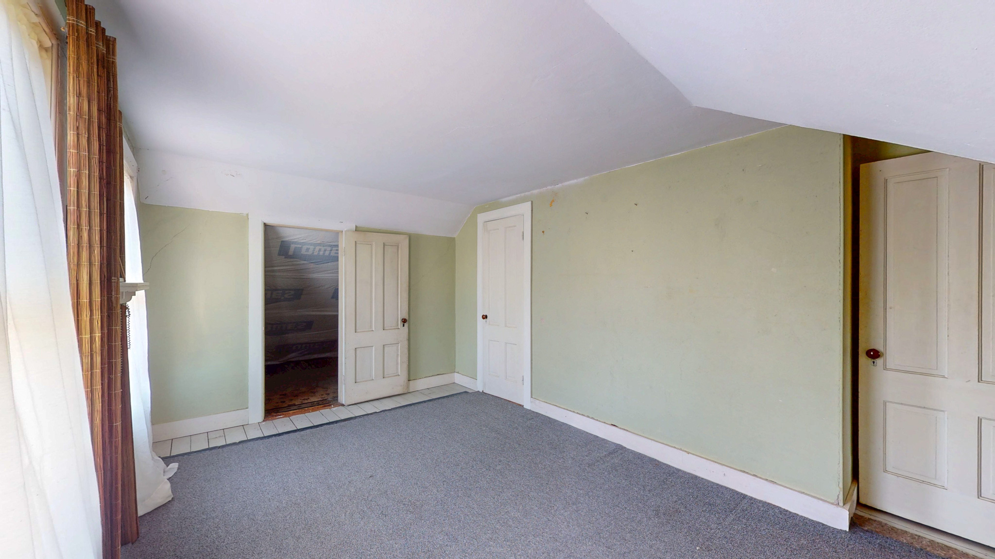 37 Sylvan Street Groton, CT 06340 - Photo 28 of 36 an empty room with closet and a hallway
