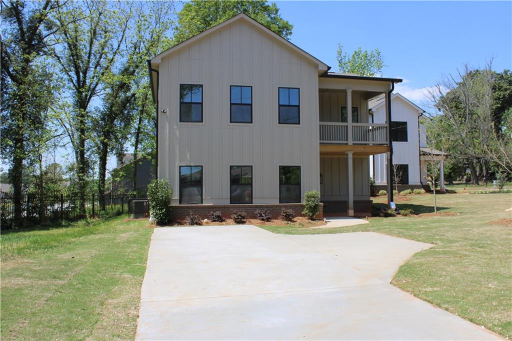 580 Glendale Road Scottdale, GA 30079 - Photo 2 of 3 a front view of house with yard