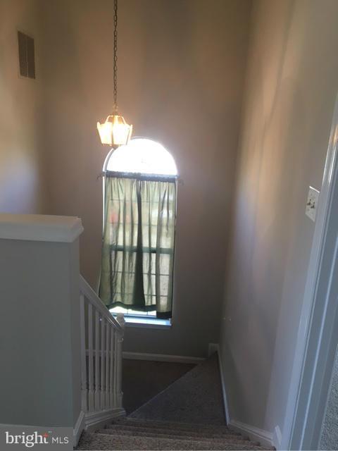 4401 Cole Farm Road Baltimore, MD 21236 - Photo 15 of 21 a view of an empty room with a window