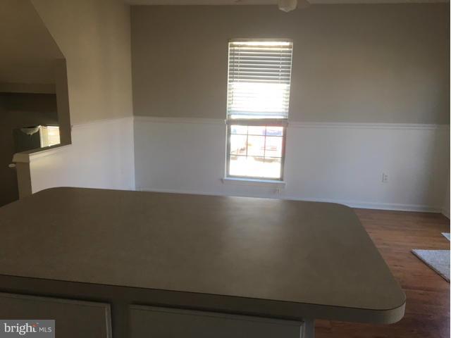 4401 Cole Farm Road Baltimore, MD 21236 - Photo 17 of 21 a view of room window and wooden floor